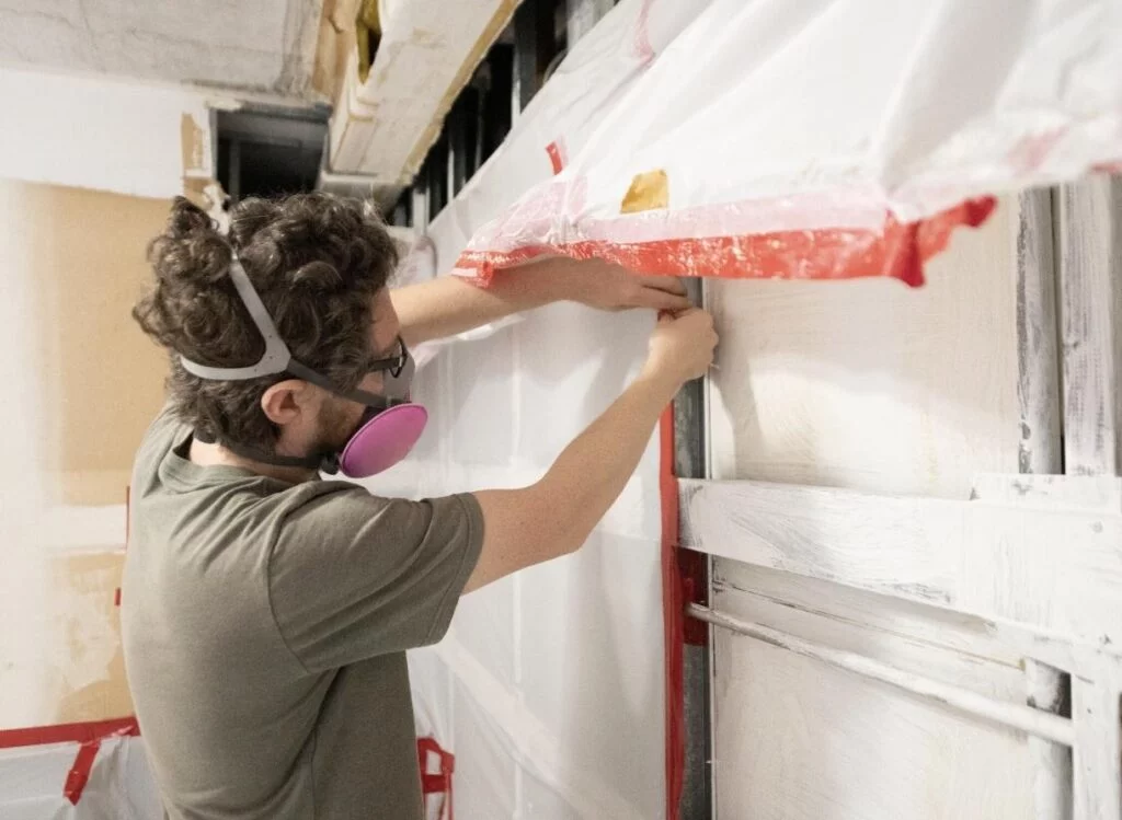 image of a person inspecting a post mold remediation job lehi ut